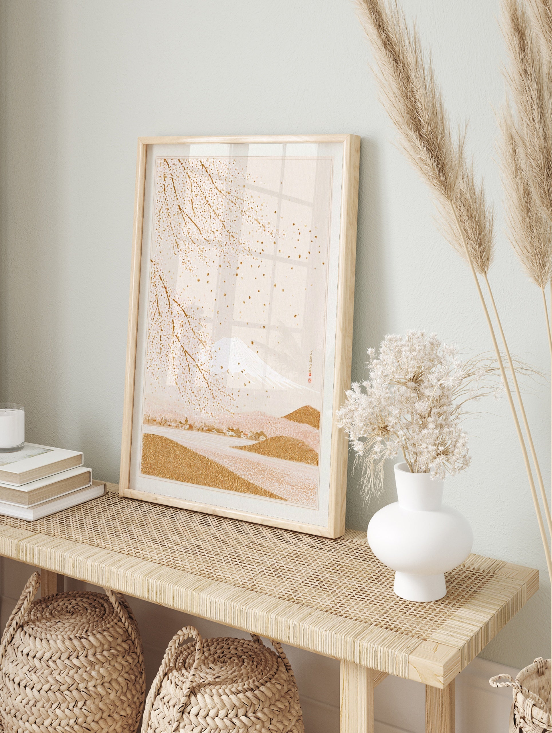 Japanese-style wall art print with gold Mount Fuji and white cherry blossoms on a soft beige, in an alternate framed mockup