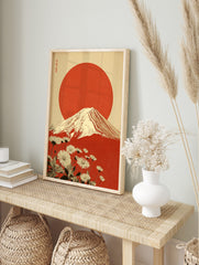 Japanese Mount Fuji art print with large red sun, white daisy flowers, and kanji text on, in an alternate framed mockup