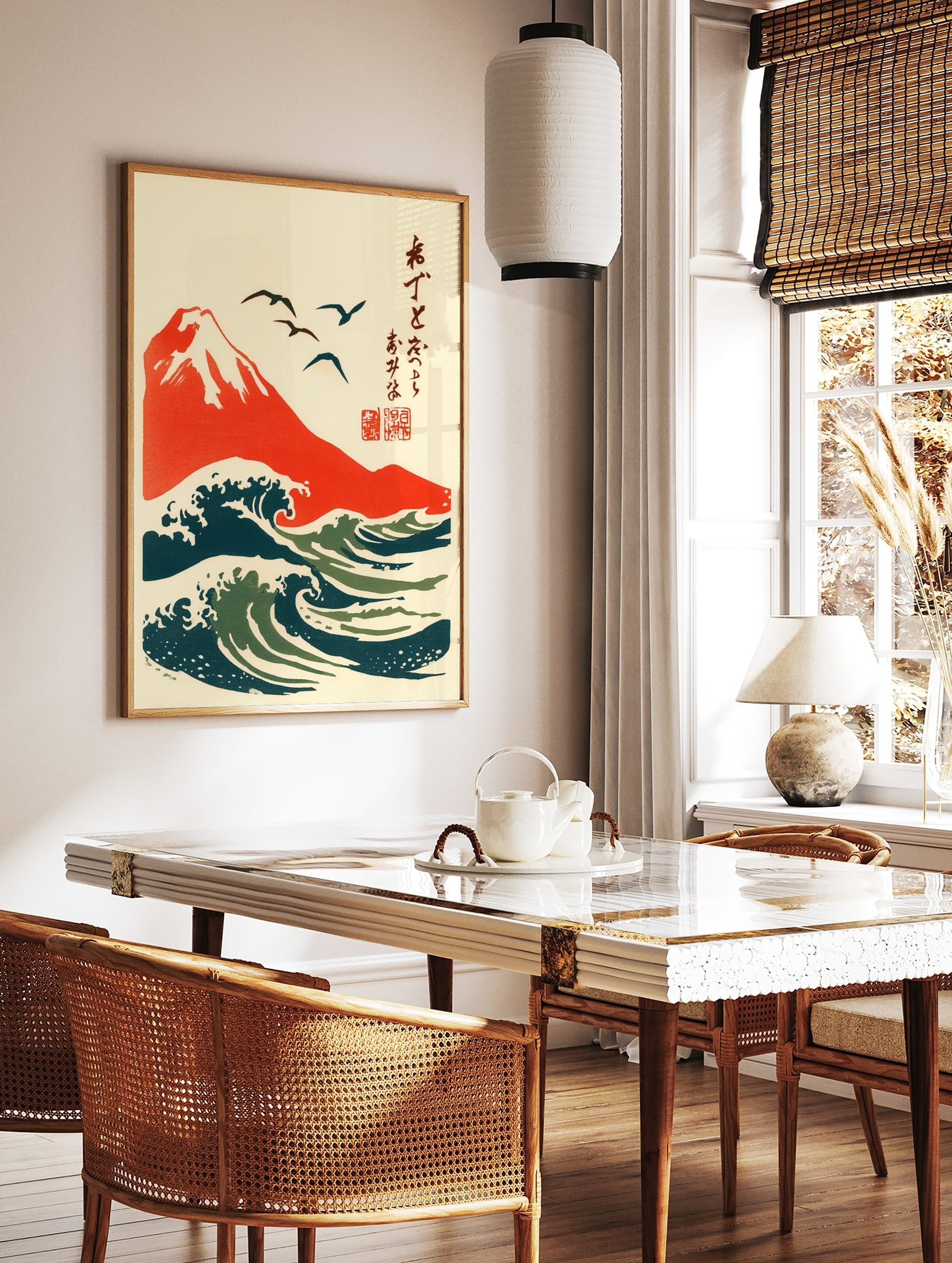Japanese woodblock style art print of red Mount Fuji, dark blue and green ocean waves, and flying, in a styled room mockup