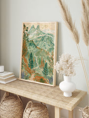 Illustrative mountain landscape wall art print featuring two hikers on a trail with pine, in an alternate framed mockup