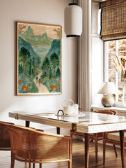 Illustrative mountain valley scene with two hikers on a path and large orange flowers in the, in a styled room mockup