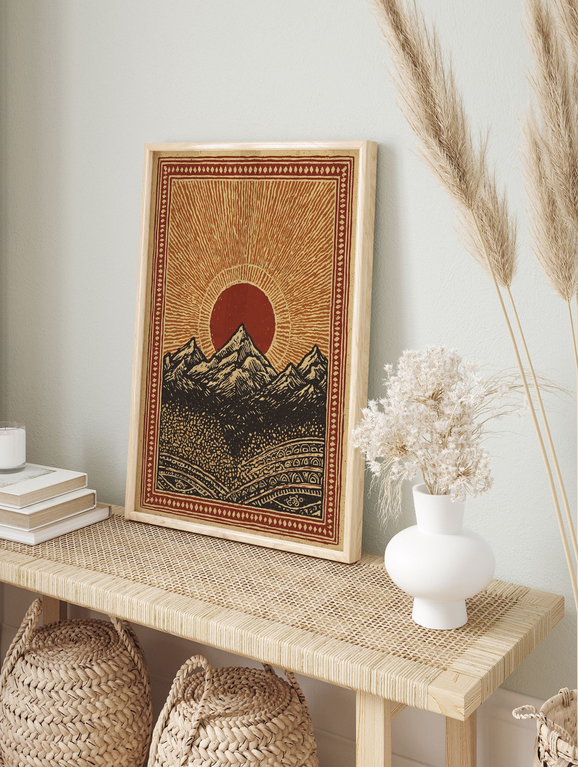 Mountain landscape poster featuring a bold red sun rising over dark peaks with intricate patterned borders. - Image 4