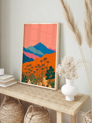 Vibrant abstract mountain landscape wall art with orange foreground, blue mountains, and stylized botanical plants. - Image 3