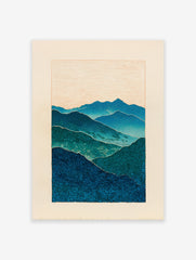 Blue and green layered mountain landscape wall art print with textured patterns and a light beige sky.