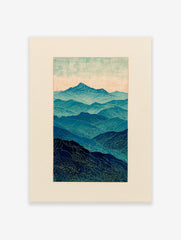 Stylized blue mountain landscape wall art print with layered peaks and wavy textures under a light sky.