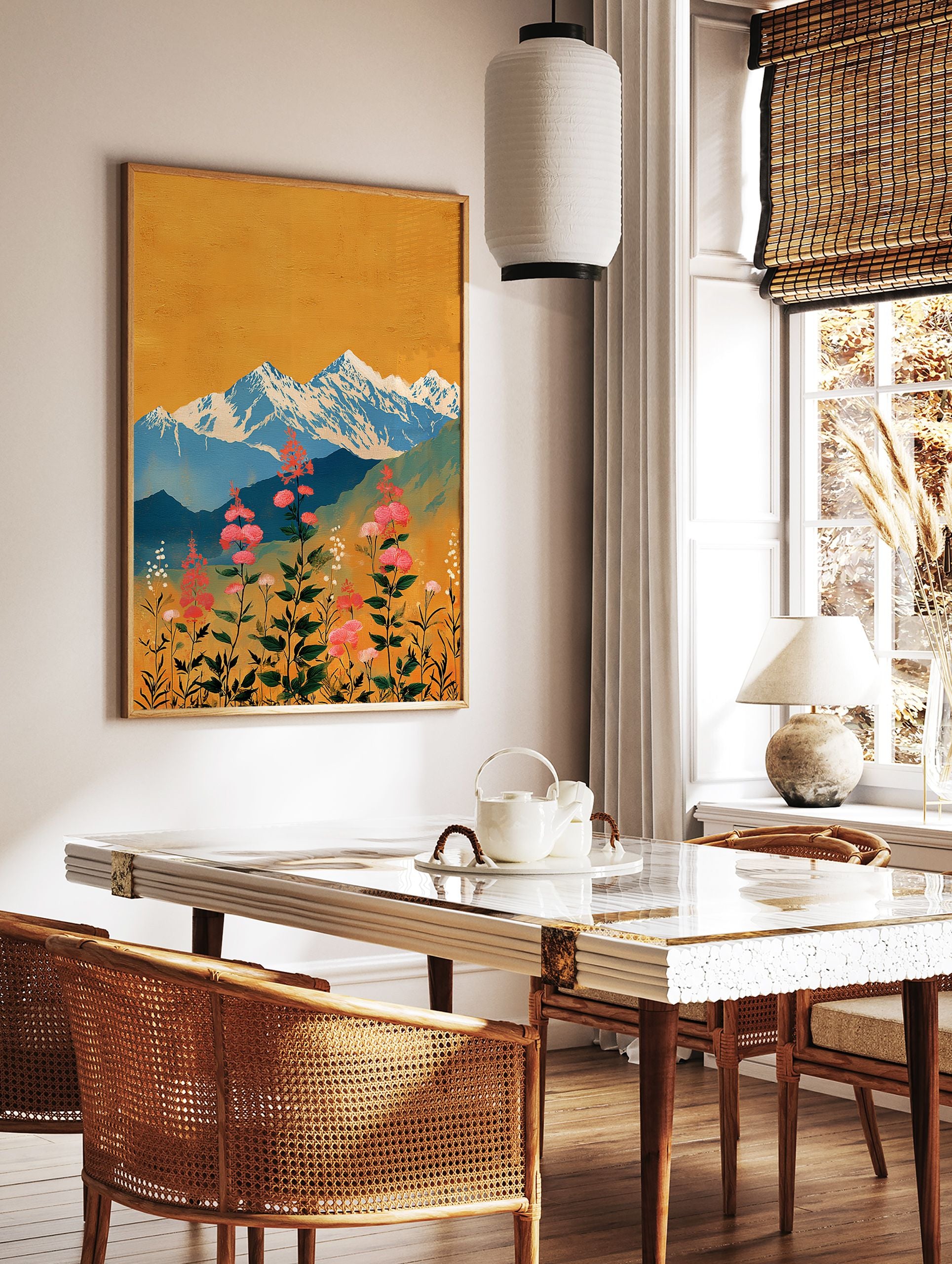 Vibrant mountain wall art featuring pink flowers in a meadow with blue snowy peaks and a golden yellow sky in an illustrative style. - Image 2