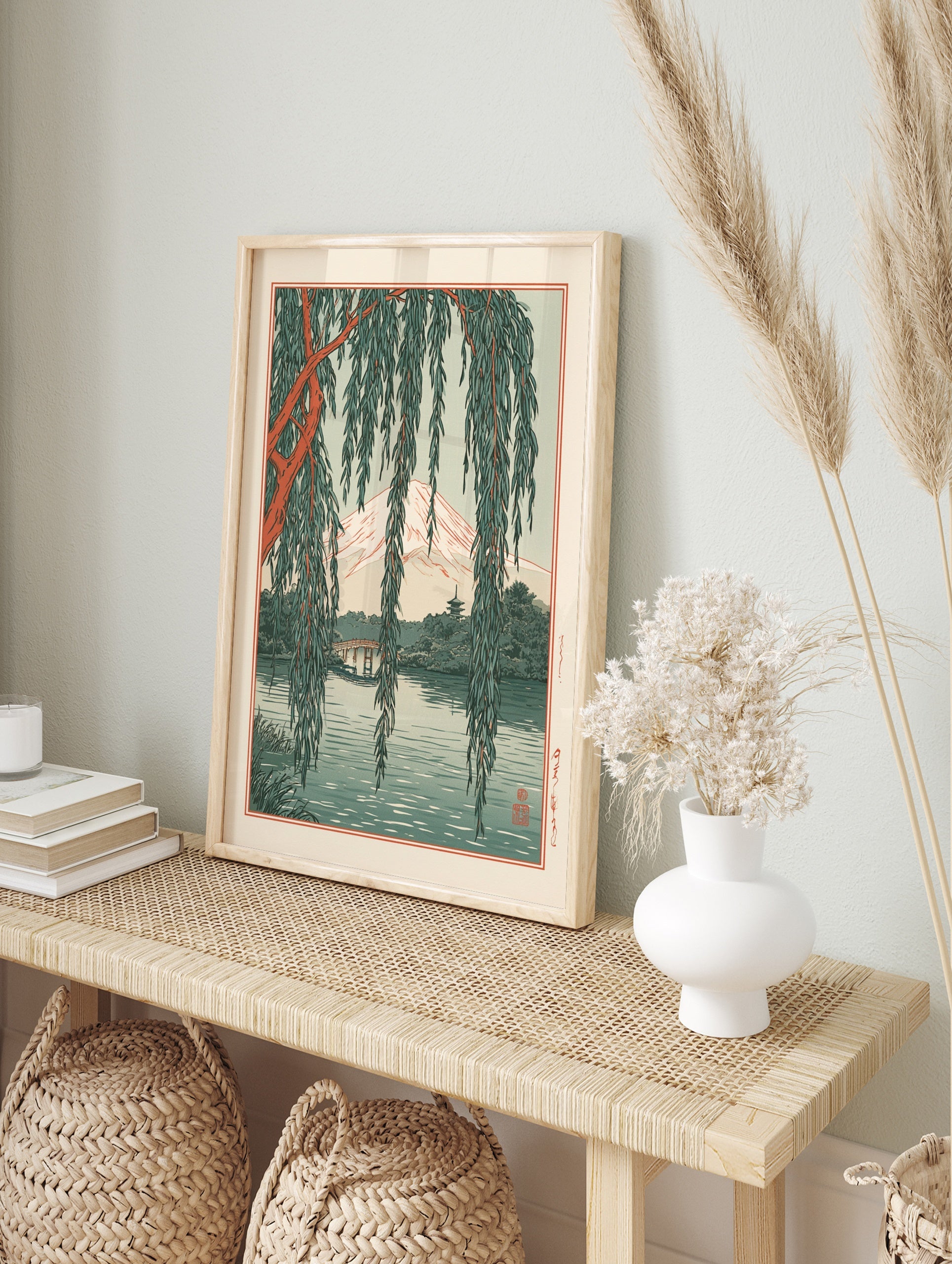 Japanese landscape art print featuring Mt. Fuji, a pagoda, and a bridge framed by hanging, in an alternate framed mockup