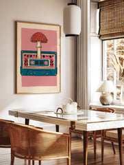 Retro cassette tape illustration with a red mushroom and floral pattern on a pink background, in a styled room mockup