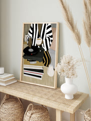 Illustration of a person in striped clothing using a vinyl record player with a cup and, in an alternate framed mockup