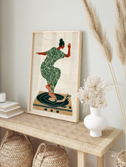 Illustrated music wall art print of a woman in a green leaf-patterned dress dancing on a turntable. - Image 3