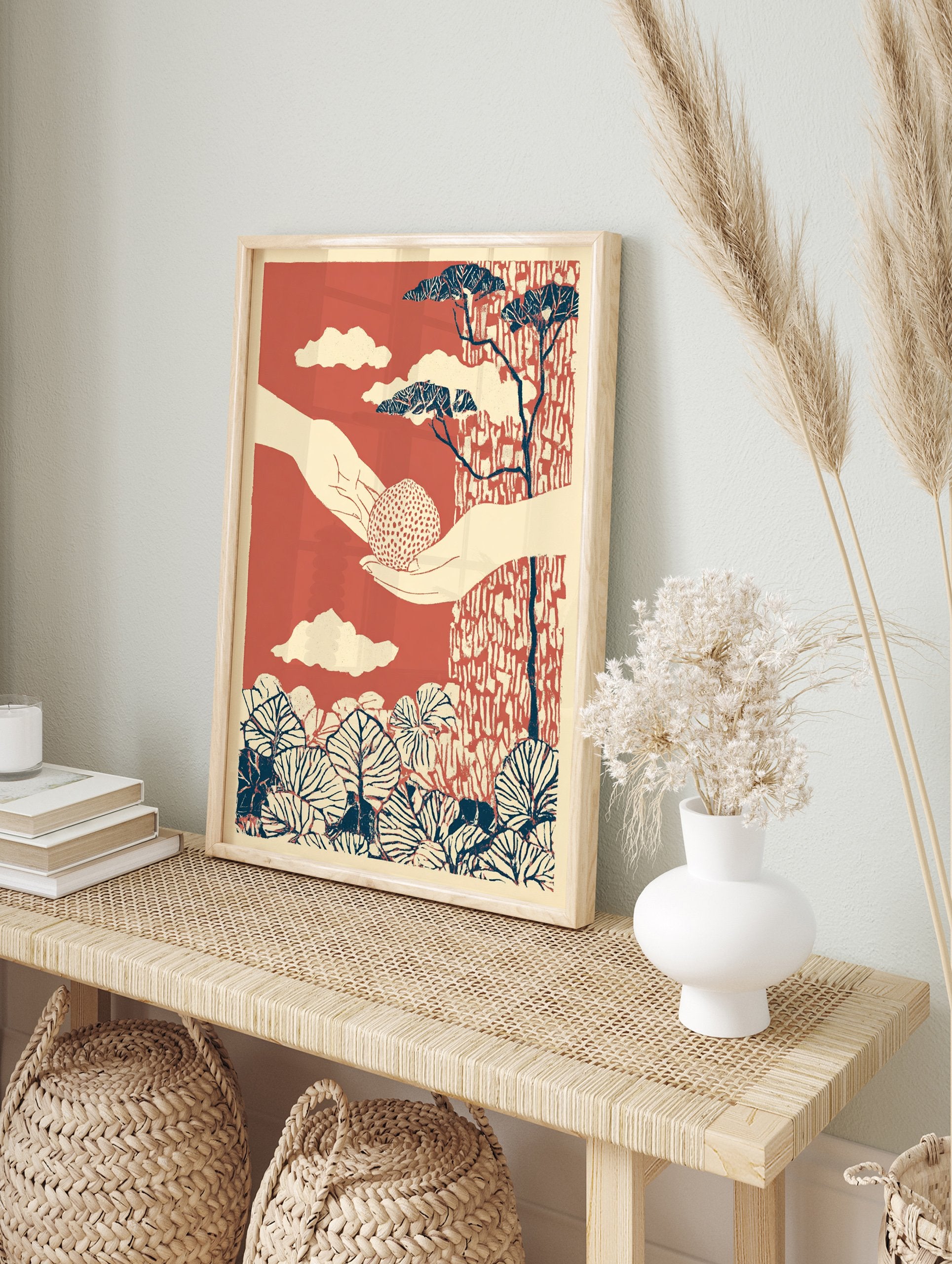 Nature illustration print featuring two hands holding a dotted seed, with stylized trees, clouds, and leaves in terracotta, cream, and blue. - Image 3