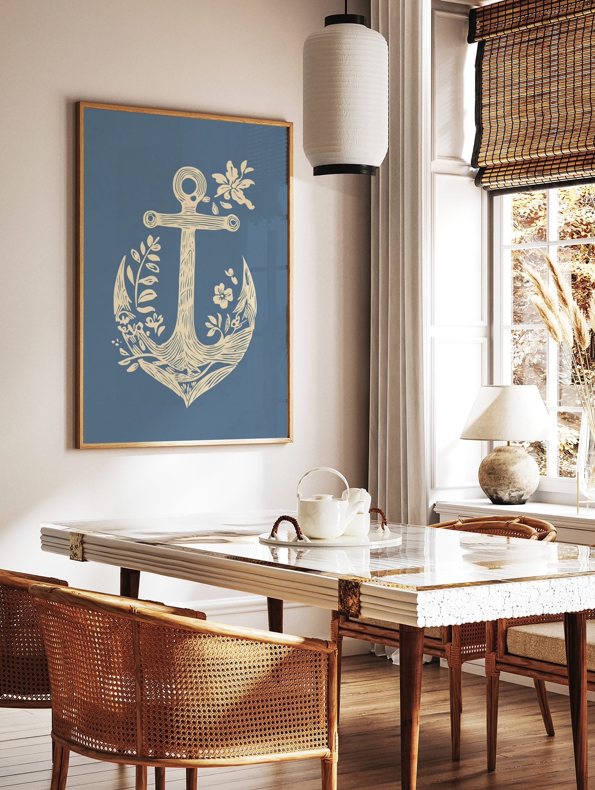 Cream anchor with botanical leaves and flowers on a blue background in an illustrative style, in a styled room mockup