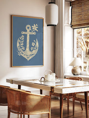 Cream anchor with botanical leaves and flowers on a blue background in an illustrative style, in a styled room mockup
