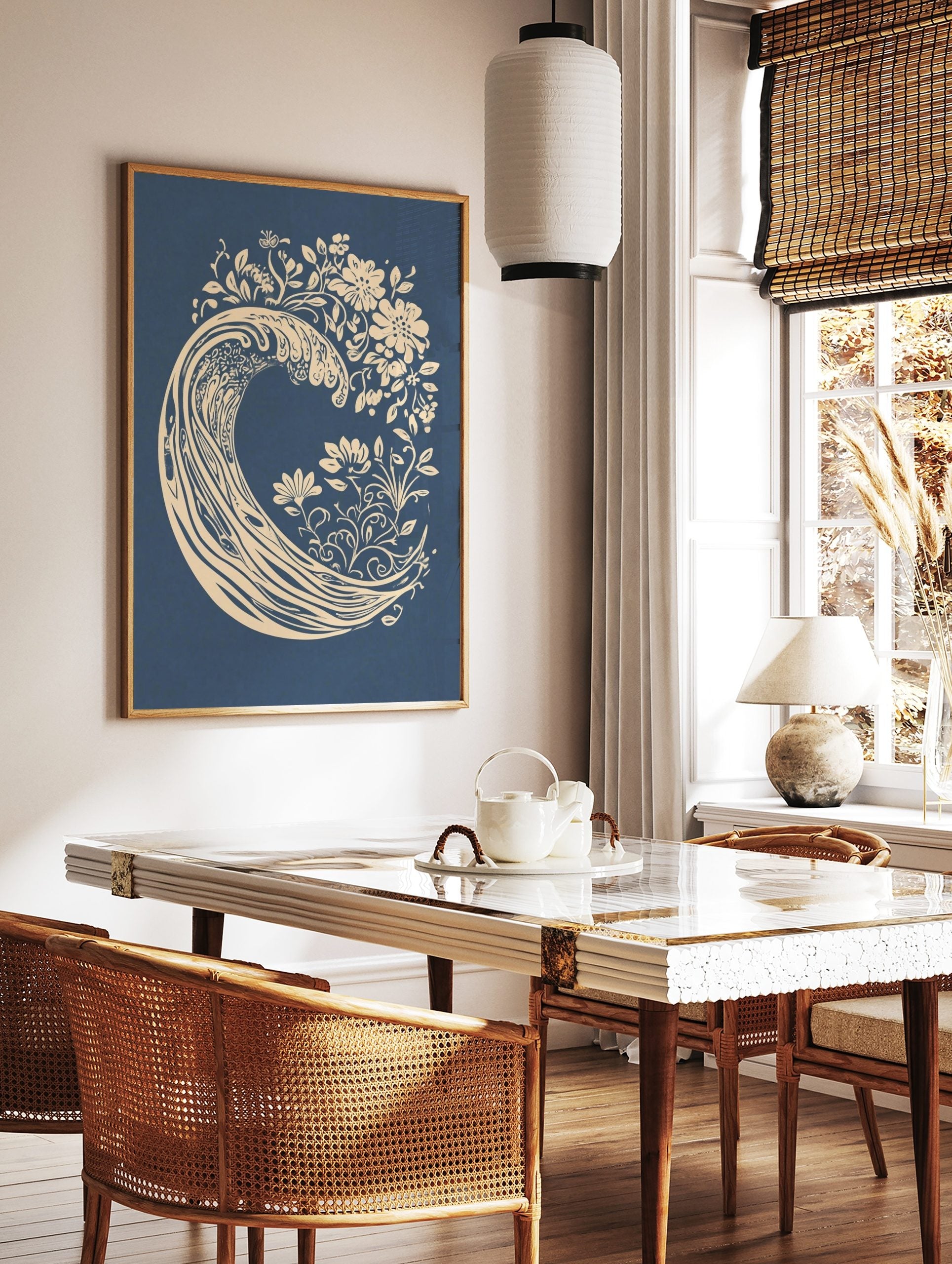 Stylised cream ocean wave with botanical flowers and leaves on a deep blue background, illustrative, in a styled room mockup