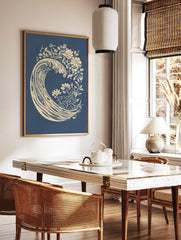 Stylised cream ocean wave with botanical flowers and leaves on a deep blue background, illustrative, in a styled room mockup