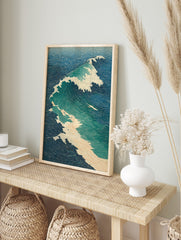 Dynamic ocean wave in Japanese ukiyo-e style with blue, teal, and white foam on textured water, in an alternate framed mockup