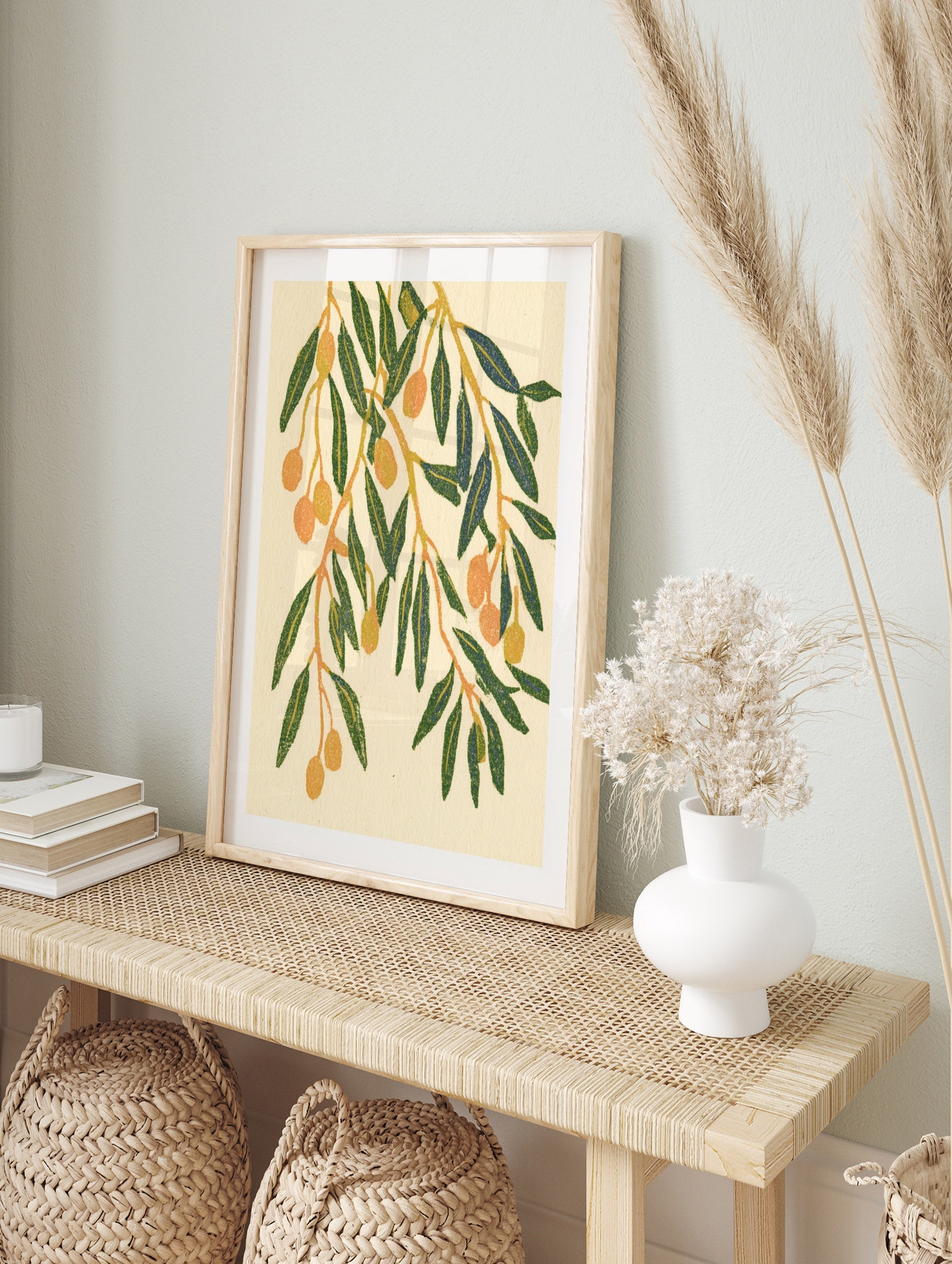 Olive branch botanical illustration with green leaves and orange olives on a cream background, in an alternate framed mockup