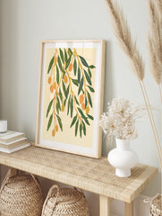 Olive branch botanical illustration with green leaves and orange olives on a cream background, in an alternate framed mockup