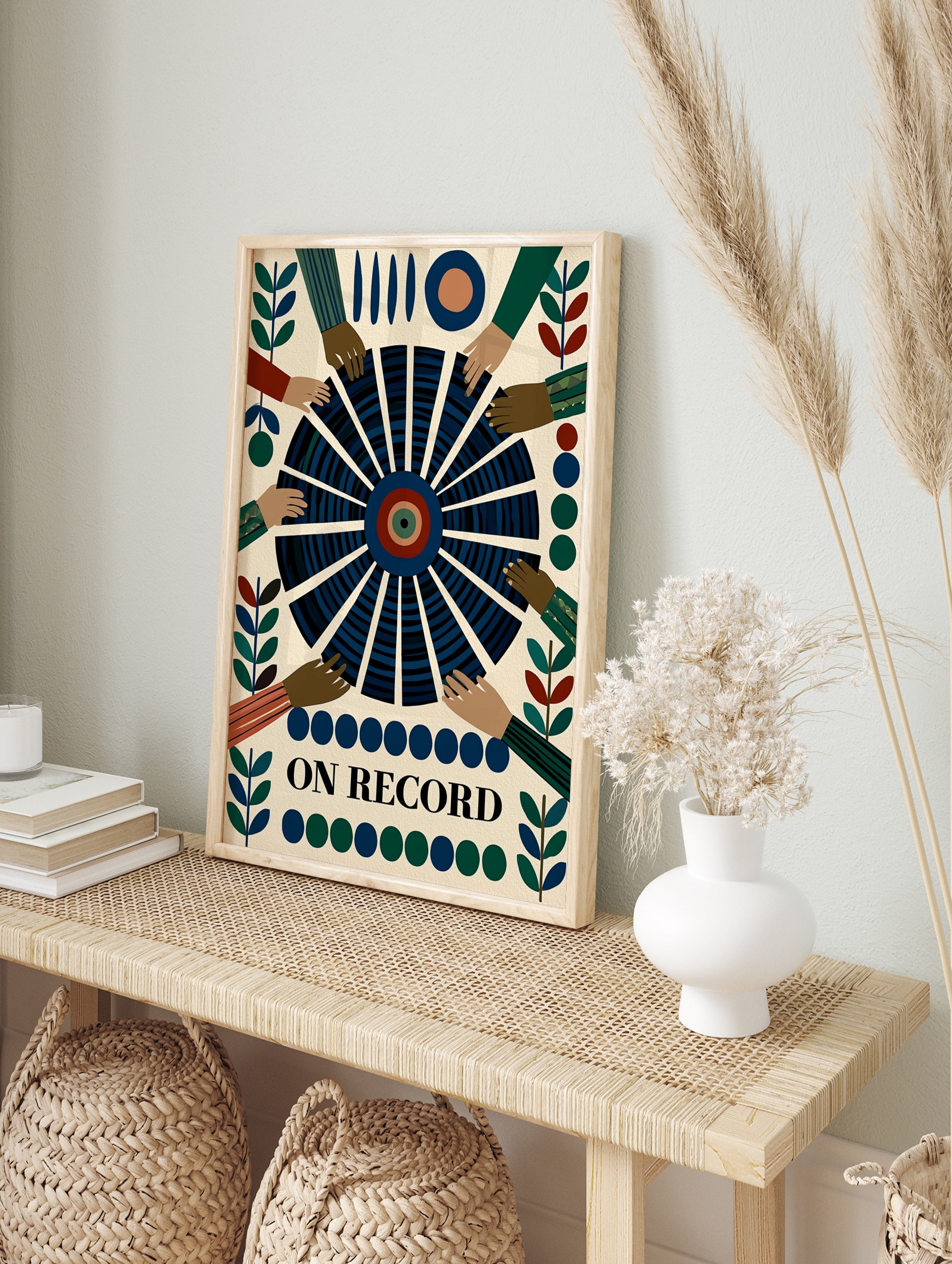 Graphic wall art print titled ON RECORD featuring a central vinyl record with reaching hands, in an alternate framed mockup