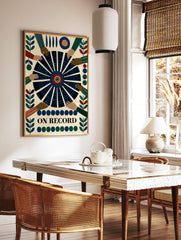 Graphic wall art print titled ON RECORD featuring a central vinyl record with reaching hands on a, in a styled room mockup