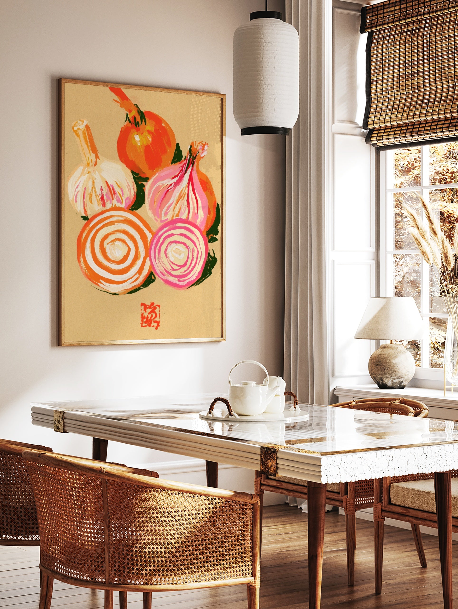 Illustrative print of a whole onion, garlic bulb, and onion slices in orange and pink tones on a, in a styled room mockup