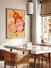 Illustrative print of a whole onion, garlic bulb, and onion slices in orange and pink tones on a, in a styled room mockup