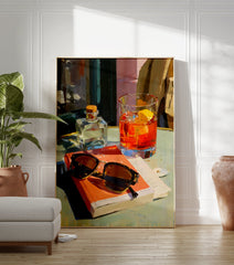 Orange cocktail art poster featuring a vibrant painting of a drink, sunglasses, and a book on a cafe table. - Image 3