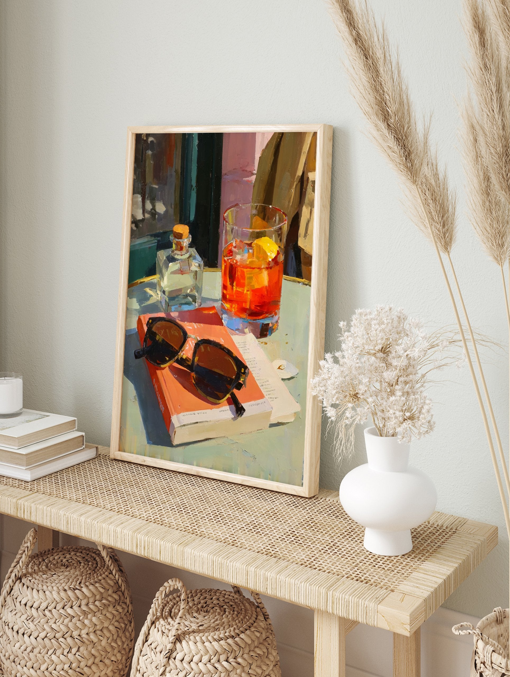 Orange cocktail art poster featuring a vibrant painting of a drink, sunglasses, and a book on a cafe table. - Image 4