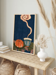 Japanese style illustration of an orange fruit and steaming tea bowl against a deep blue, in an alternate framed mockup
