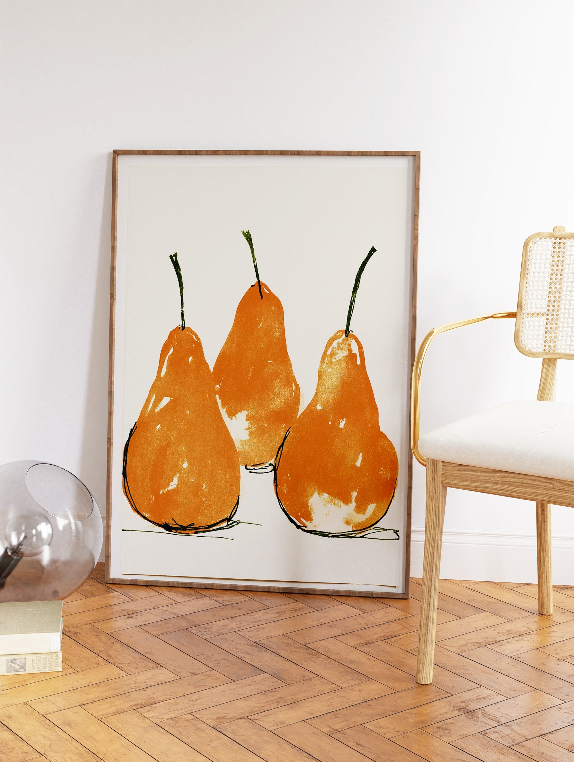 Three vibrant orange pear botanical art prints with green stems on a cream background, displayed as wall art. - Image 2