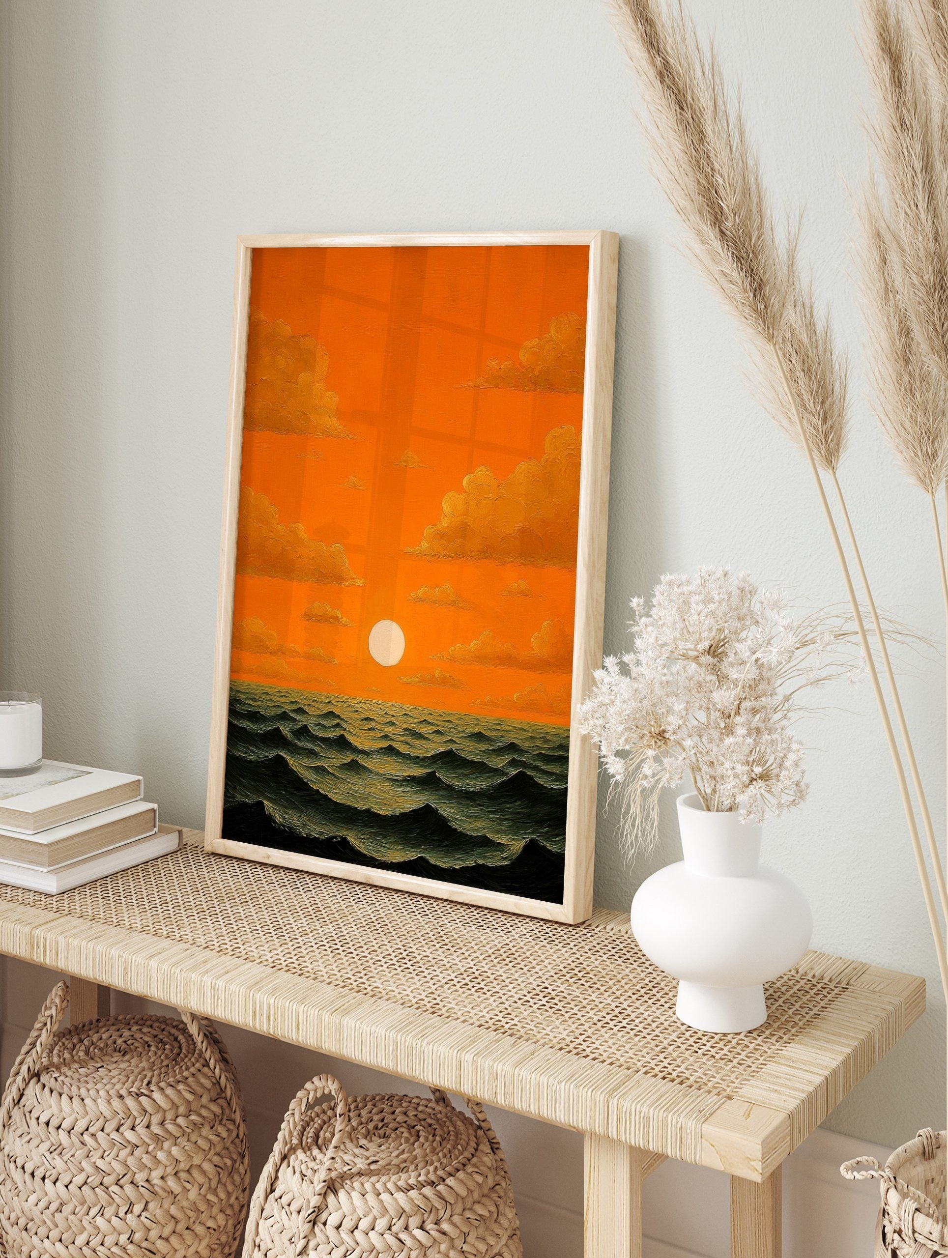 Dramatic orange sunset over dark wavy ocean with bright white sun and golden clouds, oil, in an alternate framed mockup