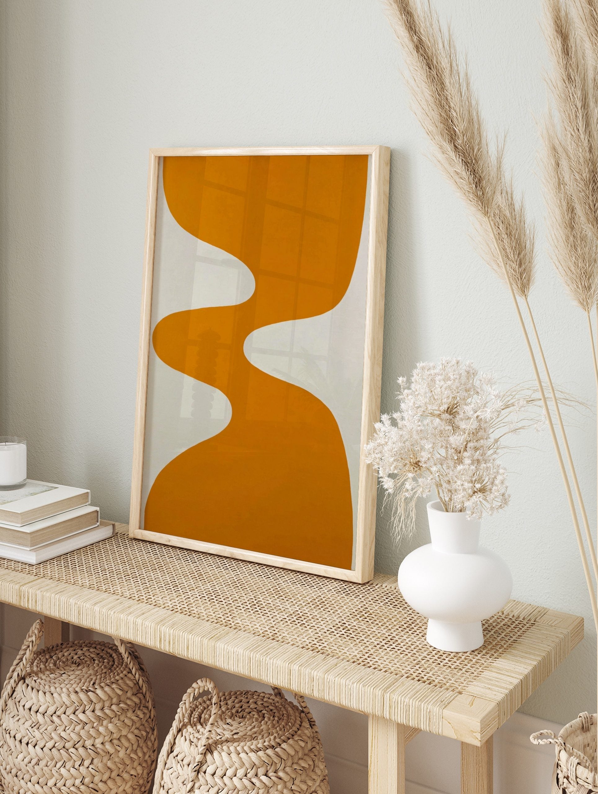 Orange wavy abstract shape on a white background, minimalist modern art print, in an alternate framed mockup