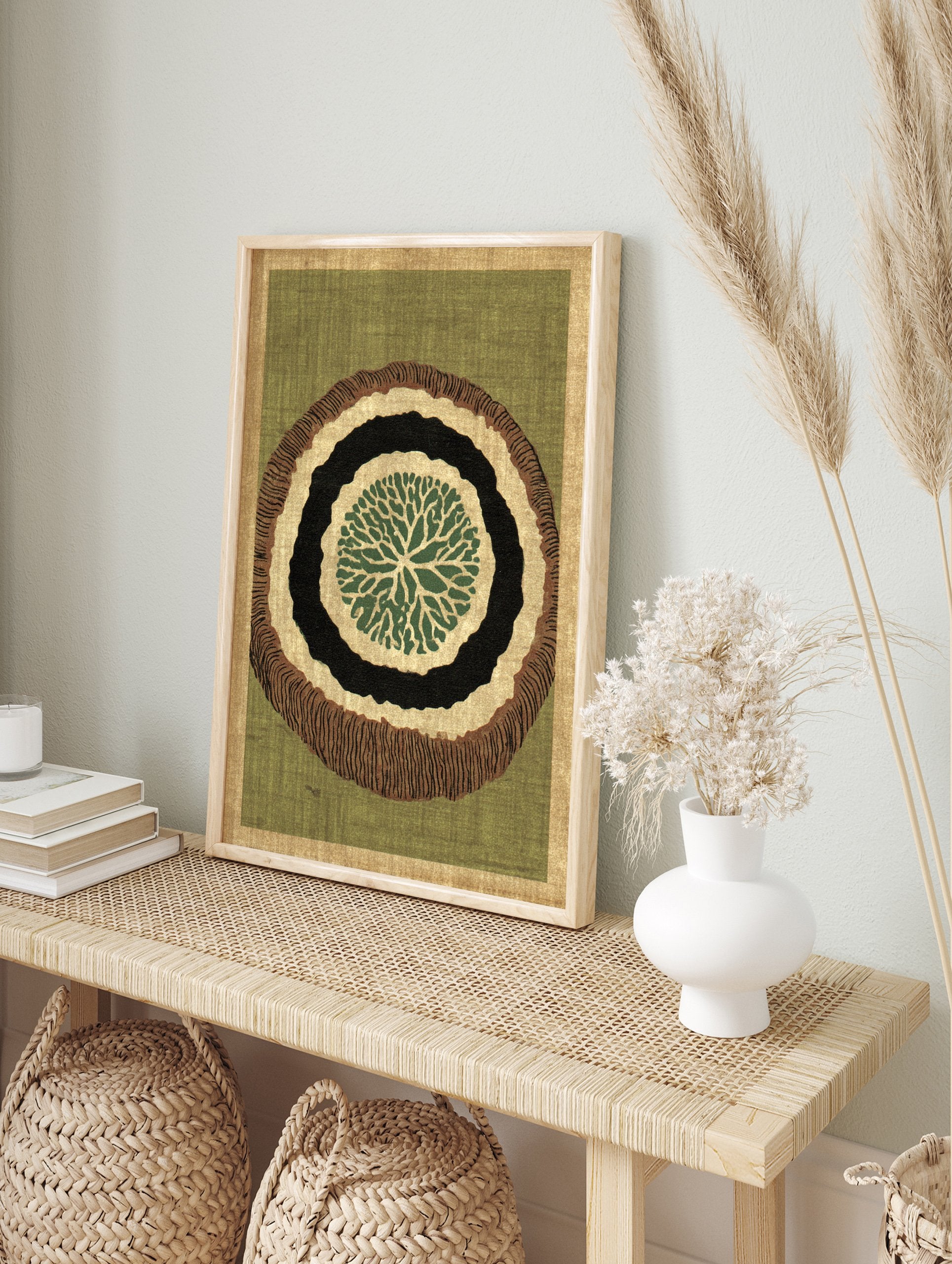 Organic abstract wall art print with green, black, and brown concentric rings, resembling a tree slice, on a green background. - Image 3