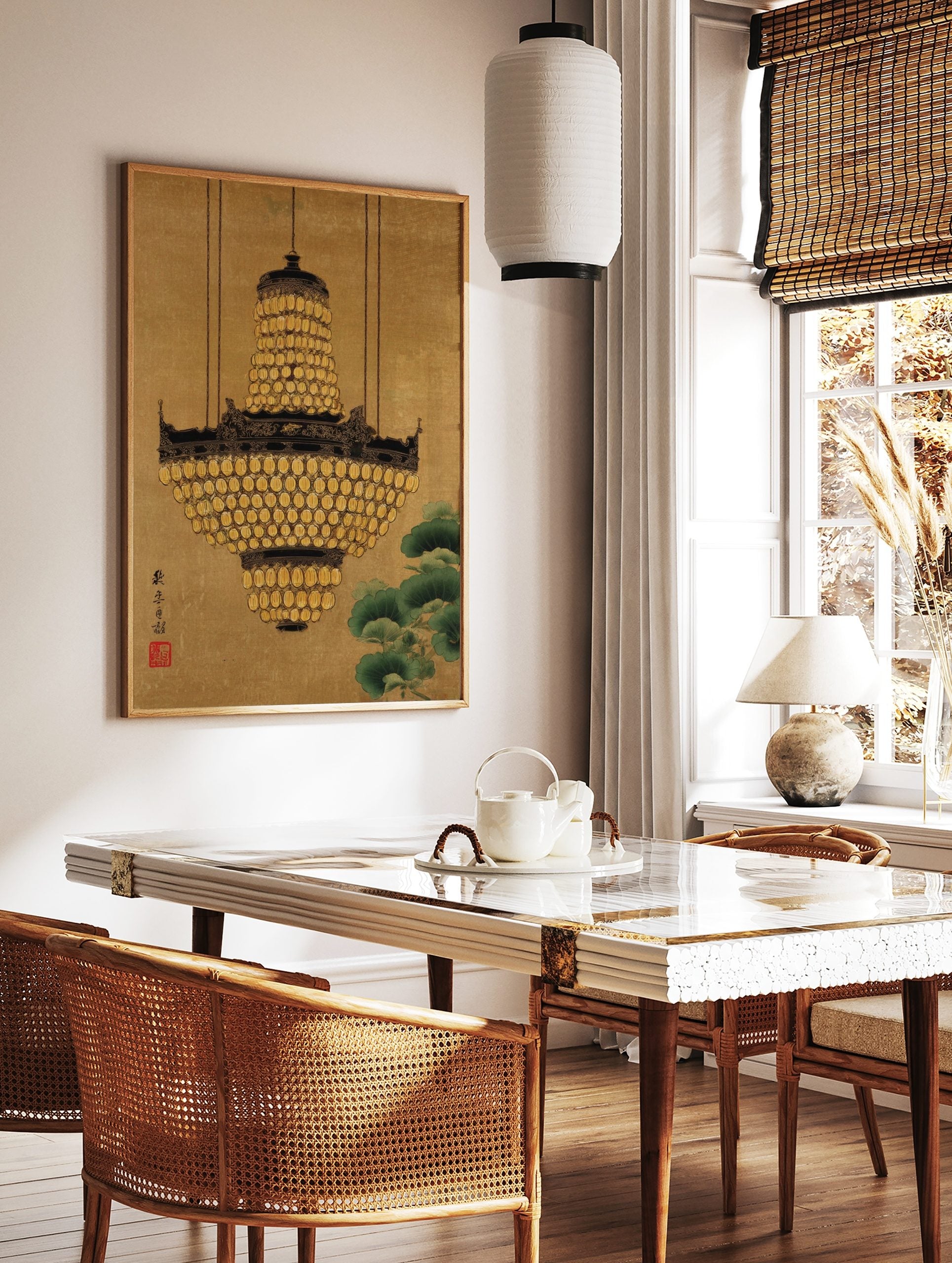 Ornate golden chandelier with many lantern-like elements hanging from chains, with green ginkgo, in a styled room mockup