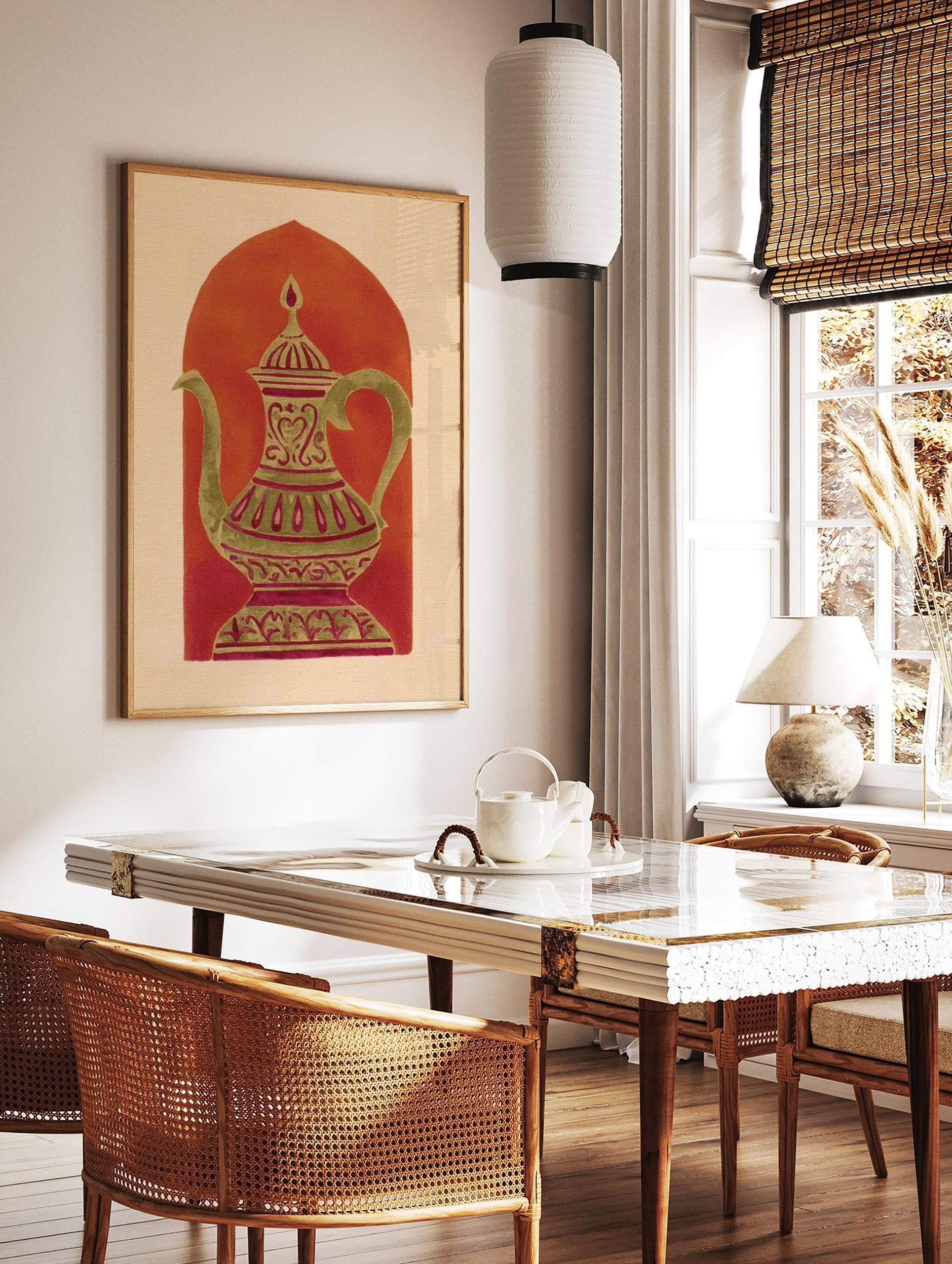 Ornate gold-green coffee pot with magenta patterns against a reddish-orange arch on a beige, in a styled room mockup