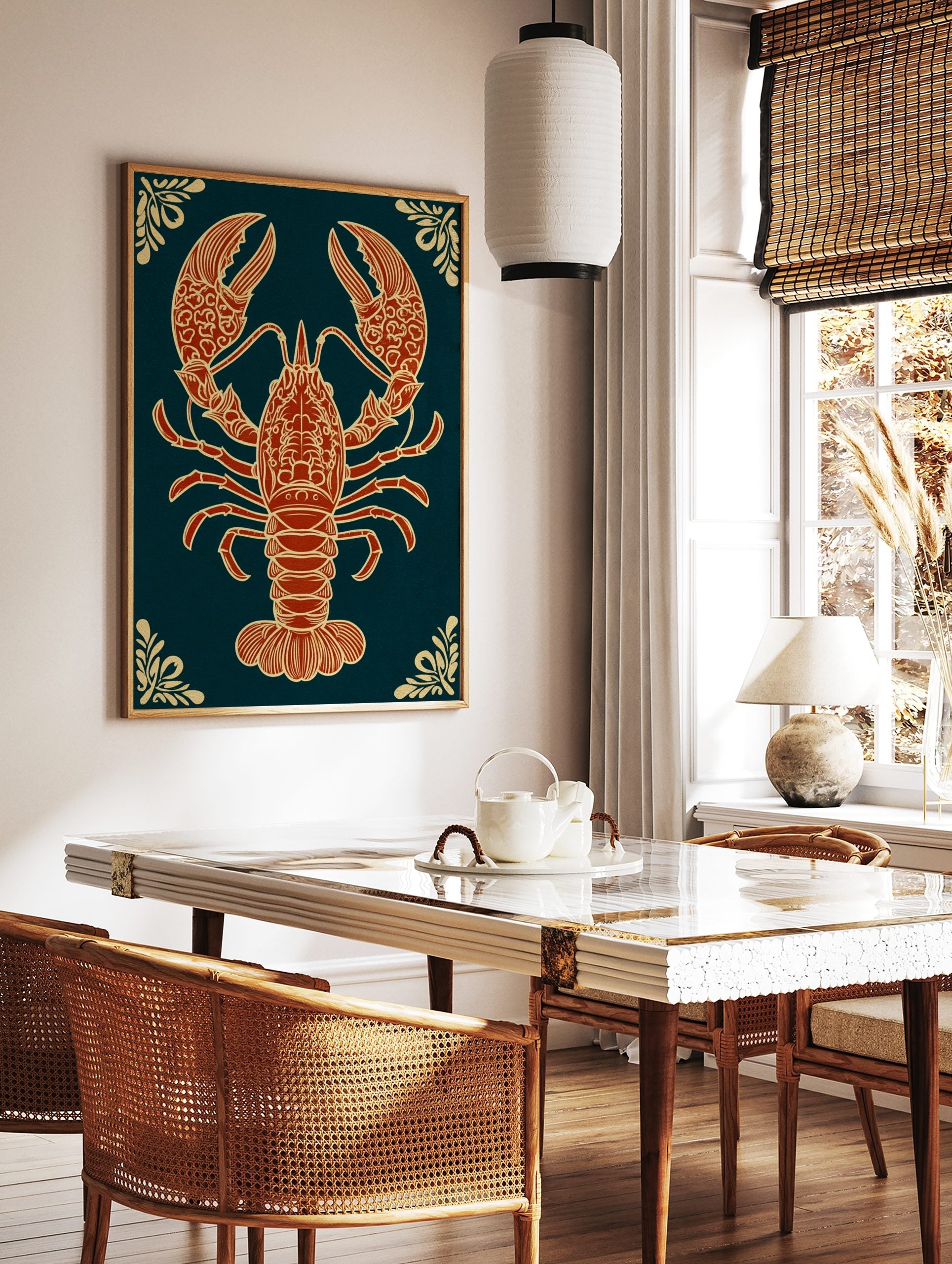 Ornate red-orange lobster illustration with gold details on dark teal background, portrait, in a styled room mockup