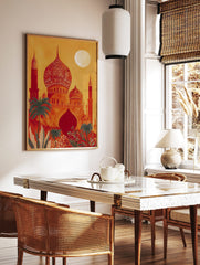 Ornate red and orange Indian-style palace with domes, minarets, green palm trees, and full moon in, in a styled room mockup