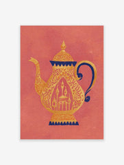 Ornate golden teapot with dark blue accents and intricate patterns on a coral background, showing a mosque within
