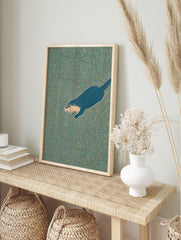 Illustrated otter wall art showing a blue otter swimming in textured teal and orange water. - Image 3