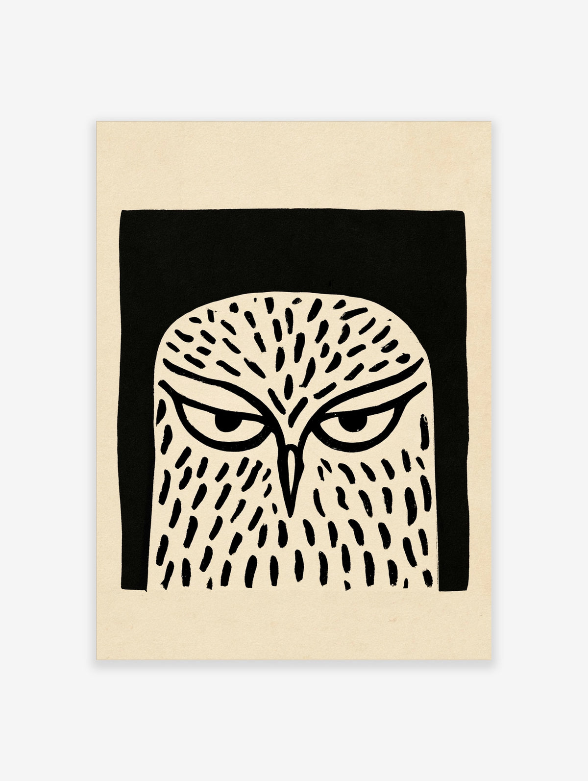 Black and white owl face wall art print with bold graphic lines and a solid black border