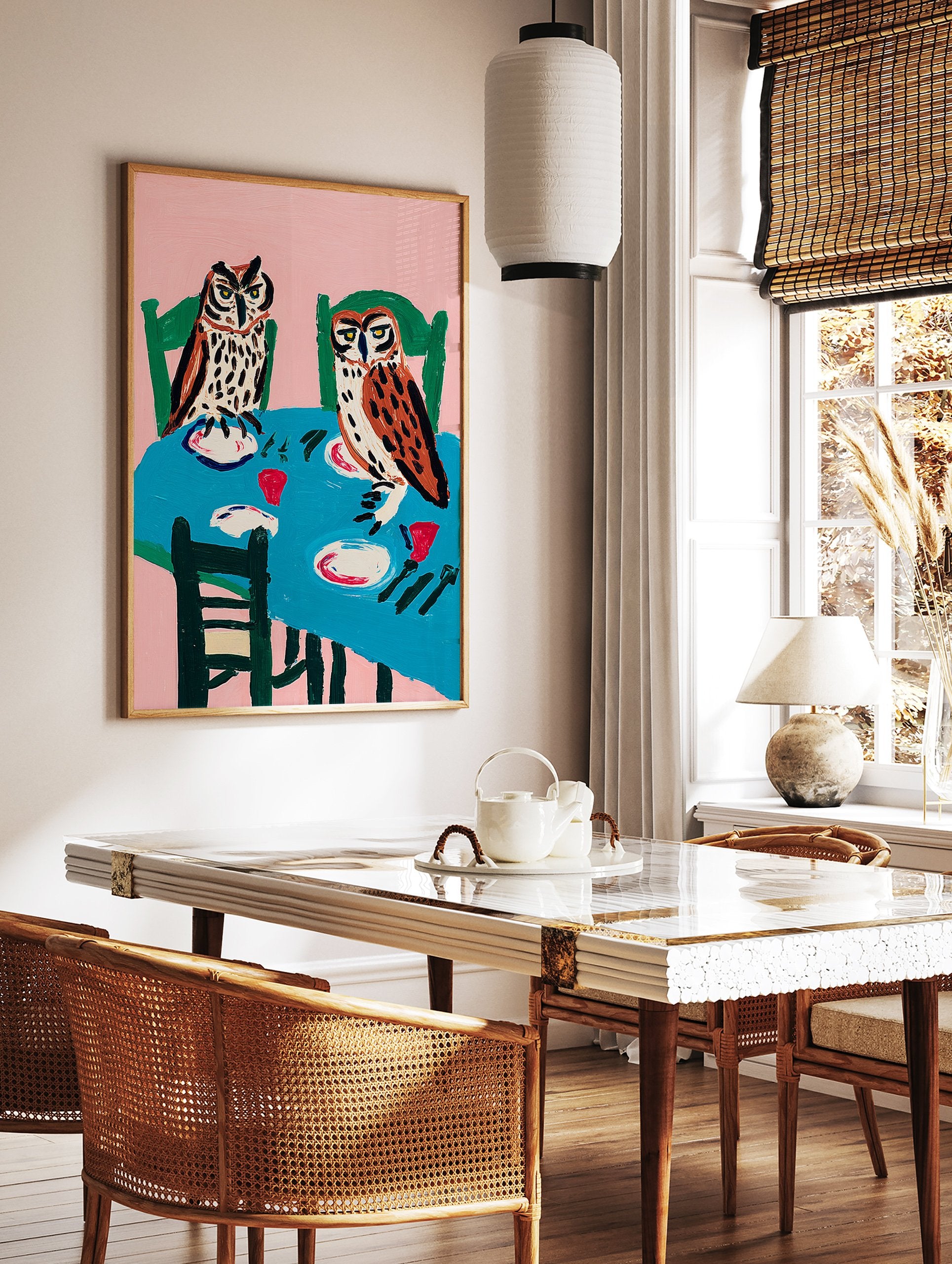 Illustrative owl wall art painting depicting two owls sitting at a dinner table with plates and cups against a pink background. - Image 2