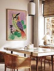 Illustrative owl with red eyes and purple wing on branch, Japanese characters, purple halftone, in a styled room mockup