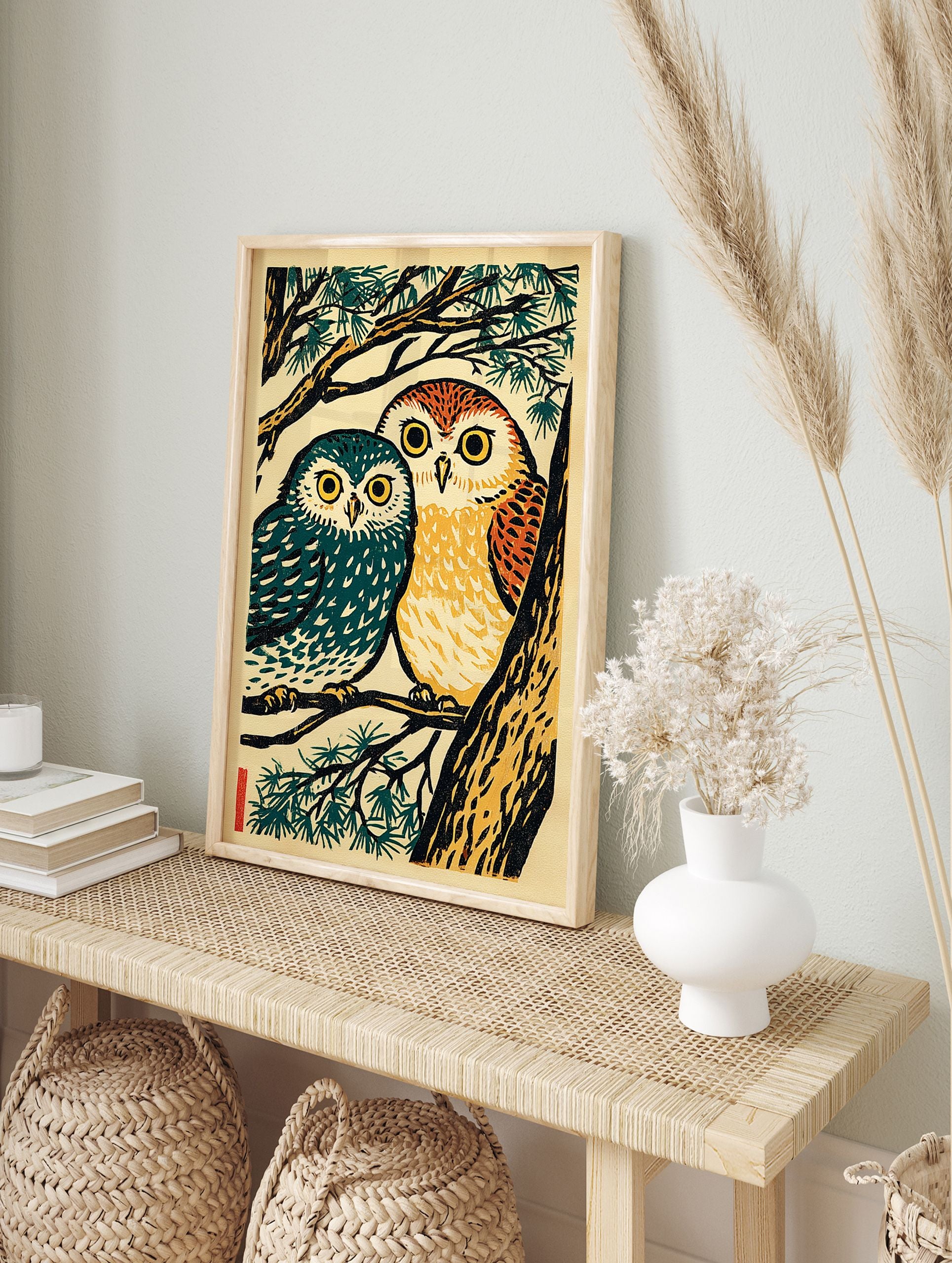 Japanese woodcut style print of two owls, one teal and one orange, perched on a pine tree branch with green needles. - Image 3