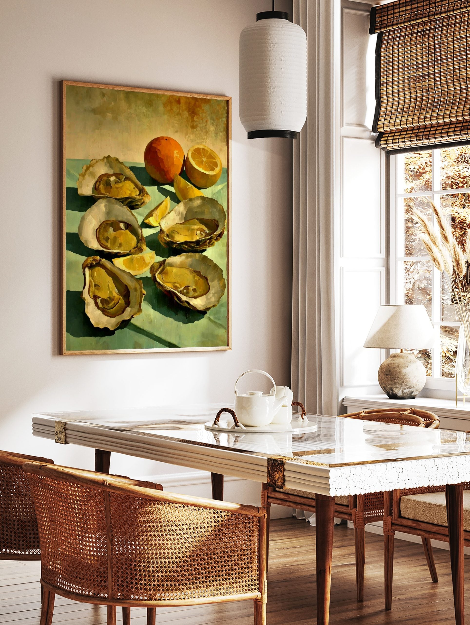 Still life painting of five golden oysters, a whole orange, and lemon slices on a teal surface, in a styled room mockup