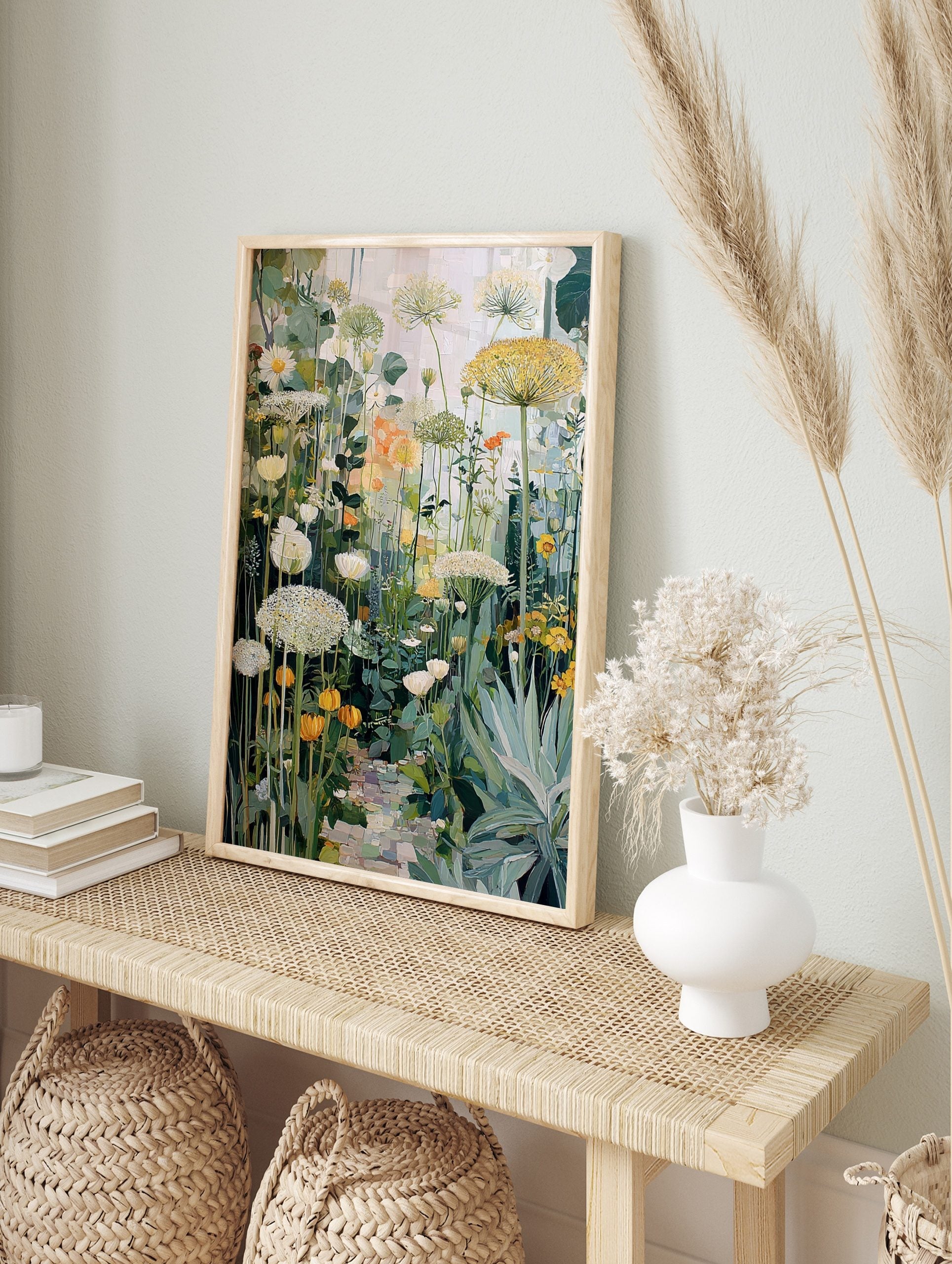 Painterly garden wall art with white, yellow, orange flowers, green leaves, and a cobbled path, in an alternate framed mockup