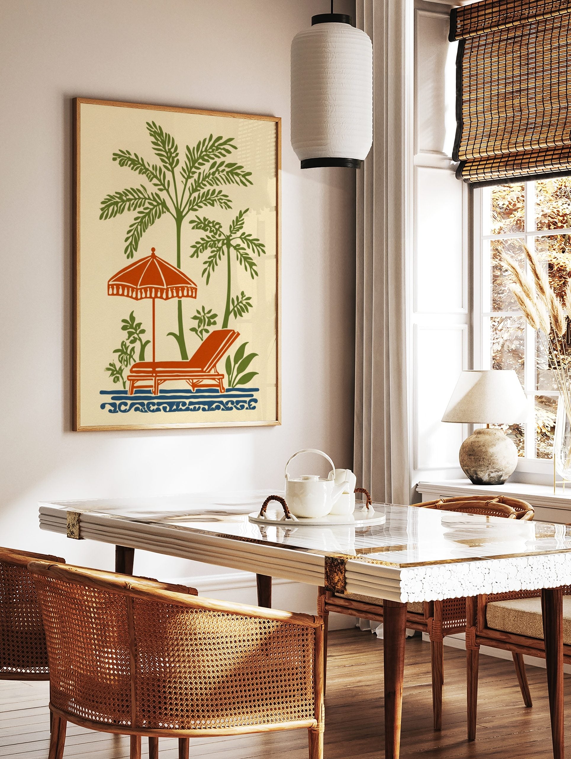 Vintage illustration of green palm trees, orange beach umbrella, lounge chair, and blue waves on a, in a styled room mockup