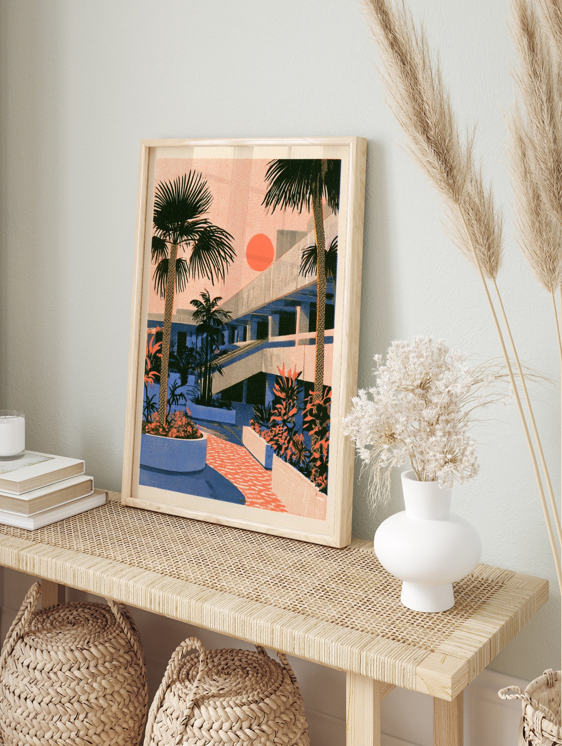 Retro architectural illustration featuring palm trees, a modernist building, and a bright, in an alternate framed mockup