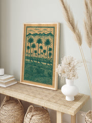 Green palm tree landscape poster with mountains and clouds in an illustrative style on a brown background. - Image 4