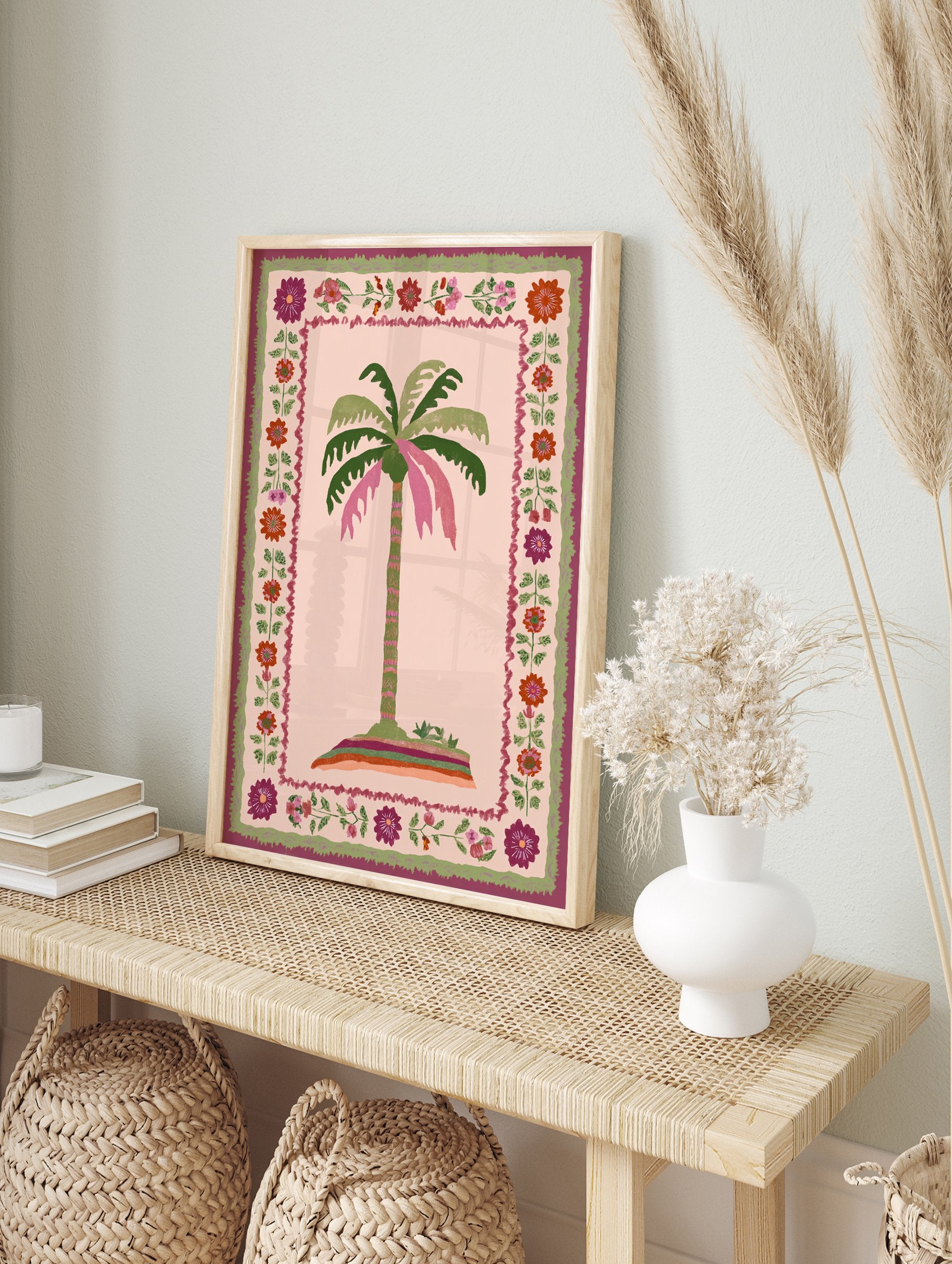 Tropical palm tree poster with pink and green fronds on an island, surrounded by a folk art floral border with red, purple, and pink flowers. - Image 4