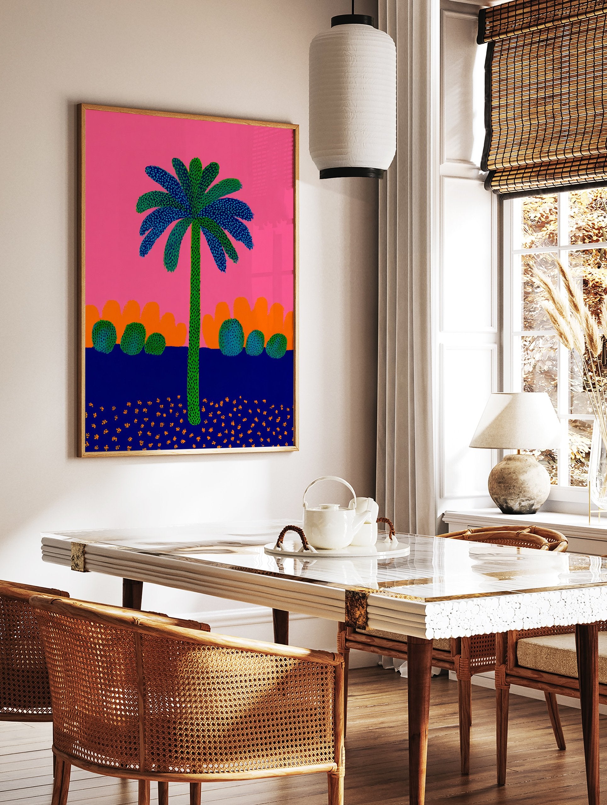 Vibrant palm tree poster with green trunk and blue/green dotted leaves against a bright pink sky, orange hills, and dark blue ground with orange flecks. - Image 2